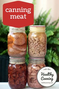 three jars filled with food sitting on top of a table