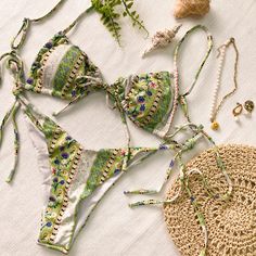 Material: This Green Bohemia Print Straps Bikini Set is made of 82% polyester 18% spandex. Size: S, M, L *We recommend taking measurements before ordering. Different brands use different size charts, if you want our items to fit perfectly, please check the size chart below. Thank you. Details: Green Bohemia Print Straps Bikini Set is true to size and very stretchy, size down if in between. Occasion: Best holiday gifts for mom, wife, girlfriend or women you love.Perfect for a honeymoon, summer va Green Halter Neck Swimwear For Sunbathing, Green Halter Neck Swimwear For Summer, Green Halter Neck Swimwear For Poolside, Green Halter Neck Swimwear, Green Stretch Swimwear For Pool, Green Tankini Beachwear For Pool, Green Tie-side Bottom Swimwear For Beach, Green Tie-side Bottom Swimwear For Swimming, Green Halter Neck Swimwear For The Pool