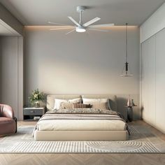 a bedroom with a bed, chair and ceiling fan in the middle of the room