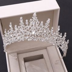 a tiara in a box on a table