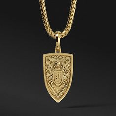 This gold lion pendant, named Empire, depicts a solid gold lion head, roaring within a shield and displaying the might and power of a ferocious born leader for all to behold. It is a powerful reminder that a beast and a king lives within us all, and its power must be unleashed in the battle to forge our Empires. MATERIALS, WEIGHTS & MEASUREMENTS: Small Size: The weight of the small 14k gold lion head pendant is 12 grams. It measures 17mm (0.67 inches) in width and 28mm (1.10 inches) in length. T Russian Eagle, Gold Pendants For Men, Gold Lion, Lion Pendant, Wolves Pendants, Luxury Packaging, Lion Head, Mens Pendant, Mens Gold