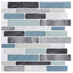 the back side of a glass and marble mosaic tile backsplash in gray, white, and blue