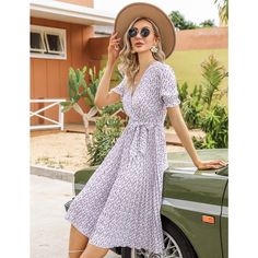 Step into summer with elegance in the WhizMax Women's Floral Wrap V-Neck Midi Dress. This charming dress is perfect for a variety of occasions, from beach outings to weddings, ensuring you look stylish wherever you go.

- Material: Soft, breathable fabric ideal for warm weather
- Features: Wrap V-neck, pleated details, short puff sleeves, elastic high waist, A-line silhouette, elegant hem, and includes a belt
- Color: Purple
- Size: 2XL
- Gender: Female

Designed with a flowy A-line cut and shor Elegant V-neck Sundress For Brunch, White Summer V-neck Dress For Beach, Summer Brunch V-neck Dress With Short Sleeves, Elegant Sundress For Spring Vacation, Chic V-neck Summer Dress For Vacation, Feminine White V-neck Beach Dress, Elegant V-neck Sundress For Day Out, Summer Midi Dress With Surplice Neckline For Vacation, Fitted V-neck Dress For Summer Brunch