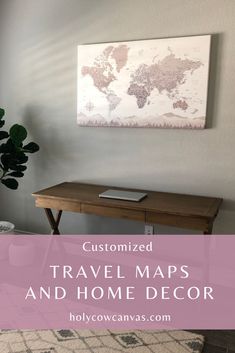 a desk with a map on the wall above it and text that reads customized travel maps and home decor