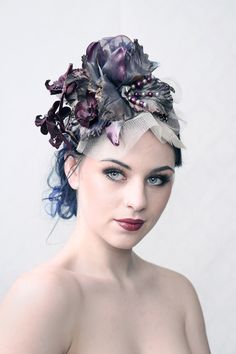 PURPLE HAZE  Fascinator Hat Collection: Ingeborg Steenhorst Hat Couture A stunning purple and silver coloured fascinator to complete your wedding dress or gala outfit. The fascinator is based on a headband wrapped in purple silk and has a big corsage made of silk orchid flowers, silk Amaryllis flowers, silver tulle, glass pearls and feathers. Couture, only one piece created One size, fits all Hat case included NOTE: THIS LISTING IS FOR THE HEADPIECE ONLY. Photography:  Tim Tronckoe, Ingeborg Ste Hat For Wedding, Industrial Punk, Ascot Races, Silk Orchids, Amaryllis Flowers, Gala Outfit, Headband Wrap, Flower Fascinator, Wedding Fascinators