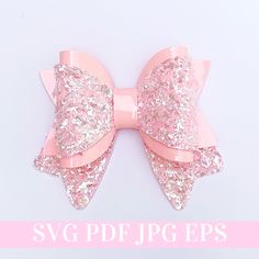 a pink bow with glitters on it