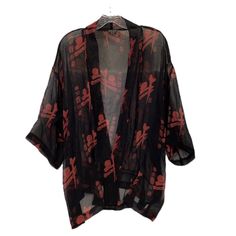 Embrace The Essence Of Asian Fashion With This Stunning Banjara Kimono. Made From 100% Silk Fabric, This Black Kimono Showcases A Beautiful Red Asian Print That Will Add Color And Vibrance To Any Outfit. The 27-Inch Length And Width Make It A Perfect Fit For Any Body Type, While The Shawl/Wrap Style Adds A Touch Of Elegance And Sophistication. The Garment Care For This Kimono Is Dry Clean Only, Ensuring Its Longevity And Keeping It Looking Brand New. Whether You're Dressing Up For A Special Occa Casual Black V-neck Kimono, Casual Red V-neck Kimono, Red Printed Kimono For Fall, Casual Red Printed Kimono, Black One Size Kimono, Black Summer Top With Kimono Sleeves, Casual Black Tops With Kimono Sleeves, Black Printed Kimono For Festival, Red Casual Kimono For Festivals