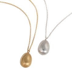 This stunning egg pendant is simple and elegant in design and features the tiny chips of new life. Inspired by the classic novel The Secret Garden, By Emily's beautiful collection is both classic and charming. Due to the soft satin finish, this weighty pendant lends itself to everyday wear as well as evening occasions. Presented in a luxurious velvet case, carefully wrapped in tissue paper.  This sterling silver necklace is also available in 18ct gold vermeil. Each pendant measures 2cm x 1.5cm s Gold Egg, Gold And Silver Jewelry, Silver Jewelry Pendant, Handmade Design, Gold And Silver, Gold Vermeil, Sterling Silver Necklaces, Pendant Jewelry, Silver Pendant