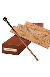 two harry potter wands in a box with a wooden handle and brown leather case