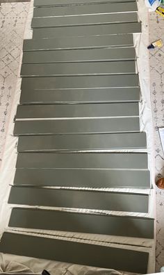 the steps are being painted and ready to be installed