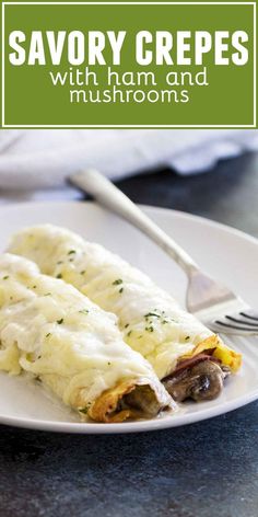 savory crepes with ham and mushrooms on a white plate next to a fork