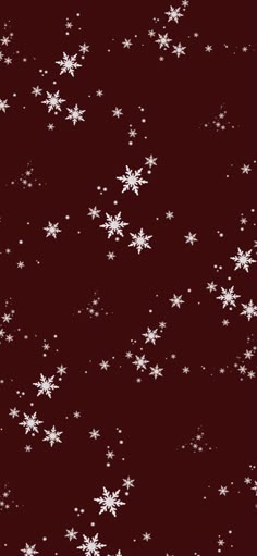 snow flakes on a dark red background with white stars in the center and bottom