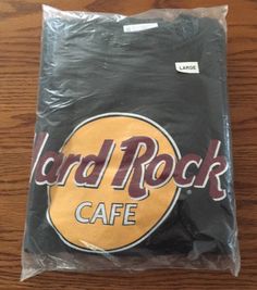 NEW IN ORIGINAL SEALED PACKAGING  Vintage 1980s Hard Rock Cafe Chicago long sleeved sweatshirt  Classic HRC original 80s logo Size Large 42-44 Color black Rock Band Logo T-shirt In Relaxed Fit, Chicago Sweatshirt, Hard Rock Cafe Sweater, Hard Rock Cafe Tshirt, Cotton Rock And Roll T-shirt With Band Logo, Vintage Hard Rock Cafe Sweatshirt, 80s Logo, Hard Rock Café, Black Order