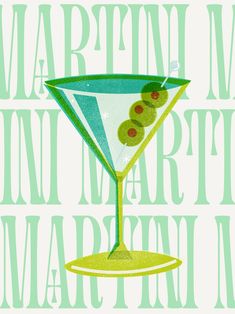 a martini glass filled with olives on top of a green and white sign that says martini