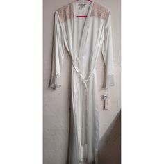 Linea Donatella Women's Ivory Satin Embroidered Robe Size S/M New W/ Tags Brand New Condition With Tags See Pictures For Details Measurements Laying Flat: Sleeve:20" Shoulders:16" Chest:21" Bottom:24" Length:50" Selling As Is Fitted Lace Robe For Loungewear, Fitted Feminine Robe With Lace Trim, Feminine Fitted Robe With Lace Trim, Elegant Fitted Cream Robe, White Feminine Fitted Robe, White Lace Trim Robe For Summer, Fitted Spring Daywear Robe, Fitted Robe For Spring Daywear, Fitted Lace Trim Sleep Robe