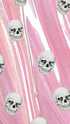 skulls on pink and white background with silver glitters for wallpaper or wrapping paper