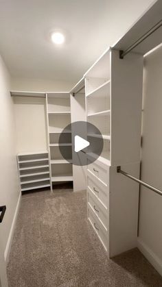 an empty walk in closet with shelves and drawers