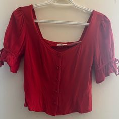 Red Button Up Blouse From Francesca’s When It Was Closing In My Area! Never Worn But Washed Already, It Was Too Small For Me. Little But Of A Puff Sleeve With Bows On The Sleeves That Are Sewn In! Size: Small, But It Can Fit Xs. Red Trendy Blouse With Button Closure, Trendy Red Blouse With Buttons, Red Button-up Summer Top, Red Button-up Top For Summer, Red Trendy Top With Button Closure, Trendy Red Top With Button Closure, Red Short Sleeve Blouse With Button Closure, Red Button-up Top For Day Out, Red Tops With Button Closure For Spring