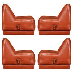 four pieces of brown leather sitting on top of each other