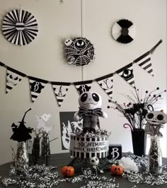 a table topped with lots of halloween decorations