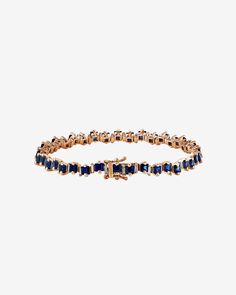 Experience the vibrant beauty of the 'Princess' Collection with this exquisite handcrafted 18-karat gold tennis bracelet from SUZANNE KALAN. Set with 7.80 carats of stunning princess cut dark blue sapphires, and alternating baguette white diamonds, this bracelet is a true masterpiece of luxury and sophistication. The timeless design of the bracelet makes it a versatile accessory that can be easily paired with any outfit, whether dressing up or dressing down. Details 18k white gold, yellow gold o Luxury Sapphire Tennis Bracelet, Timeless Blue Jewelry With Baguette Diamonds, Luxury Sapphire Jubilee Bracelet, Luxury Sapphire Jewelry With Baguette Diamonds, Luxury Blue Baguette Diamond Jewelry, Elegant Sapphire Jewelry With Baguette Diamonds, Formal Sapphire Jewelry With Baguette Diamonds, Classic Sapphire Jewelry With Baguette Diamonds, Fine Jewelry Sapphire With Baguette Diamonds