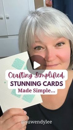 a woman holding up a card with the words crafting simpled