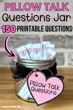 a jar full of conversation cards with the words pillow talk questions in pink and black