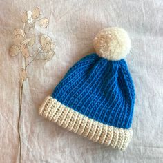 Our Sky blue two tone knitted bobble hat has been created by hand (we knit each one using traditional techniques). We believe in beautiful, practical and long lasting items which are unique, a joy to own and will be treasured for many years to come.  We use 100% wool to create our hats which makes them super warm and long lasting  || Features || - Sky blue and Natural Shetland  - Designed to fit snug to your head - 100% wool  - Available with or without a pom pom  - Pom pom (if requested) will b Blue Crochet Beanie For Cold Weather, Cozy Warm Beanie Knitting Pattern, Blue Warm Beanie One Size, Warm Blue Beanie One Size, Blue Winter Beanie, Warm Blue Beanie Cap, Blue Cozy Hat, Blue Knit Beanie For Winter, Blue Knit Beanie Cap