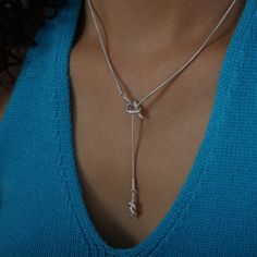 Surprise the person you love with the perfect gift! Perfect for birthdays, anniversaries, or as a "just because" gift for that special person in your life. Silver Lariat Necklace For Gift, Silver Lariat Necklace As A Gift, Adjustable Heart Pendant Necklace For Birthday, Valentine's Day Gift Silver Lariat Necklace, Heart Knot, Chain Heart, Sweater Chain, Just Because Gifts, Long Sweater