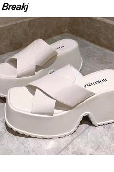 Shipping: Worldwide Express Shipping AvailableDelivery time: 7-15Days Fast ShippingReturns: Fast refund, 100% Money Back Guarantee.SPECIFICATIONSWith Platforms: YesUpper Material: PUStyle: FashionSide Vamp Type: OpenSandal Type: BasicPlatform Height: 0-3cmPattern Type: SolidOutsole Material: RubberOrigin: Mainland ChinaOccasion: CasualLining Material: PUItem Type: SandalsInsole Material: PUHeel Type: Square heelHeel Height: Super High (8cm-up)Fit: Fits true to size, take your normal sizeFashion White Closed Toe Platform Slippers For Summer, White Chunky Platform Wedge Sandals, White Closed Toe Sandals For Summer, Trendy White Chunky Platform Wedge Sandals, White Eva Wedge Sandals For Summer, Trendy White Heels With Eva Material, White High Heel Wedge Sandals For Spring, White Open Toe Eva Sandals, Trendy White Platform Slippers With Round Toe