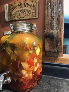 a jar filled with food sitting on top of a counter