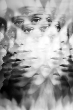 a black and white photo of a woman's face