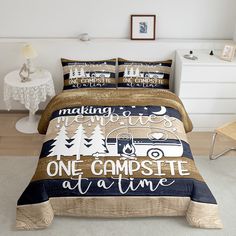 a bed room with a neatly made bed and pillows