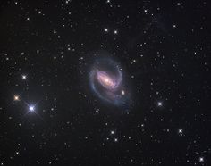 an image of a spiral galaxy in the sky