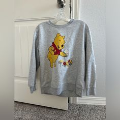 Winnie The Pooh Disney Women’s Sweatshirt. Size Is Listed As Medium But Fits Like A Small. Never Worn Because It Runs Small But In Great Condition! Winnie The Pooh Sweatshirt Nike, Winnie The Pooh Crop Top, Winnie The Pooh Embroidered Sweatshirt, Winnie The Pooh Hoodie For Women, Disney Sweatshirts Hot Topic, Teal Sweater, Disney Sweaters, Holiday Knits, Disney Men