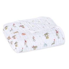 a white blanket with christmas animals on it