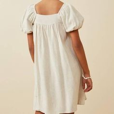 Experience the ultimate level of comfort and style with our Girls Square Neck Puff Sleeve Box Pleat Dress. Made with a luxurious linen blend woven fabric, this dress features a square cut neckline and beautiful puff sleeves that add a touch of elegance to any outfit. Material: 70% Viscose / 30% Linen Box Pleat Dress, Pleat Dress, Toddler Boots, Long Sleeve Kids, Square Neck Dress, Boys Bottoms, Boys Pajamas, Luxury Linen, Box Pleats