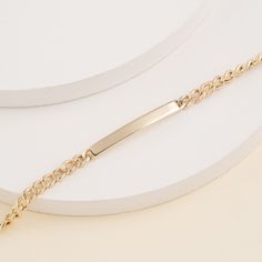 Solid gold nameplate bracelet on a chain. Elegant White Gold Luxury Name Bracelet, Luxury Elegant White Gold Name Bracelet, Name Plate Bracelet, Nameplate Bracelet, Bar Dimensions, Id Bracelets, Bar Bracelets, Cuban Link Chain, Gold Bar