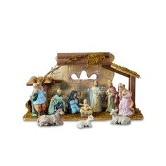 a nativity scene with figurines and lights