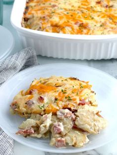 a casserole dish with ham and cheese in it on a plate next to another casserole dish