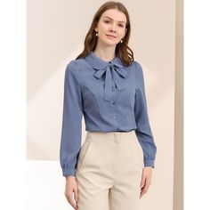 Whether you're in the office or out on the town, this cute blouse is perfect for any occasion. The soft fabric will keep you comfy all the time. Simple and classic shirts are never out of date and maintain an elegant appearance. The stylish Peter Pan collar and bow-tie neck design are different from those of classic shirts, adding a unique feminine. A classic blouse goes well with everything. It can be dressed up with dress pants or casual with skinny jeans or plaid skirts to show the preppy sty Office Long Sleeve Blouse In Solid Color, Formal Long-sleeve Solid Color Blouse, Formal Long Sleeve Solid Color Blouse, Long Sleeve Blouse With Back Button For Office, Long Sleeve Blouse With Back Button Closure For Office, Light Blue Collared Shirt For Office, Puff Sleeve Solid Color Blouse For Work, Collared Solid Color Blouse For Formal Occasions, Collared Solid Color Blouse For Formal Wear