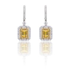 Gemstone Earrings  Light up any occasion with high quality GIA certified gemstone earrings. we are specialize in white and yellow  gemstone jewelries.   SHOP ONLINE Visit @ http://www.delicategem.com or give us a call @ (212) 354-7449 - we’re here to help.  OR stop by our NYC showroom Address @ 64 West 47th street #F18 New York NY 10036 Yellow Sapphire Earrings, Yellow Gemstone Jewelry, White Gold Diamond Earrings, Diamond Jewelry Store, Gem Diamonds, Yellow Gemstones, Double Halo, Best Jewelry Stores, Cheap Jewelry