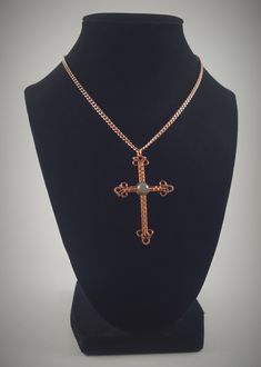 This beautiful cross pendant features a central, green aventurine bead and small purple glass accent beads.  The cross is constructed of copper wire.   The pendant measures approximately 2 ¼" from the top of the bail to the bottom of the pendant.   This pendant includes a 12" copper chain. Colors may appear different than they actually are depending on your monitor color settings and the lighting used during photography. Gemstone Meaning: Aventurine is associated with: *Balance *Calmness  *Creativity *Healing *Imagination *Independence *Prosperity Every item I create is made with great care and attention to detail; however as with all handmade items, there may be small imperfections in each item, but I like to refer to them as "added interest".  I would like to take this moment to thank yo Wire Wrapped Cross Pendant Necklace As Gift, Wire Wrapped Cross Pendant Necklace For Gifts, Spiritual Wire Wrapped Cross Pendant Necklace, Wire Wrapped Cross Necklace Gift, Wire Wrapped Cross Necklace For Gift, Wire Wrapped Crucifix Necklace For Gift, Wire Wrapped Cross, Gothic Jewelry Diy, Wire Crosses