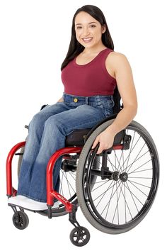 a woman in a wheel chair posing for the camera