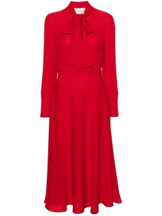 Valentino Ready To Wear crimson red silk crepe texture round neck concealed front button fastening neck tie fastening long sleeves with buttoned cuffs flared skirt long length unlined Primavera Outfit, Outfits Primavera, Stone Island Clothing, Red Silk Dress, Valentino Clothing, Moda Outfit, Crimson Red, Skirt Long, Silk Midi Dress