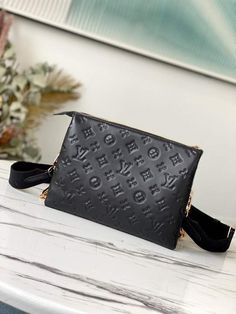 Description L.V Coussin PM Monogram Embossed Puffy Black For Women, Women’s Handbags, Shoulder And Crossbody Bags 10.2in/26cm LV M57790 Rep 1:1 One of the stars of the Spring-Summer 2021 show, the Coussin PM handbag is made from Monogram-embossed puffy. It can be worn cross-body with the strap, as a chain baguette, or comfortably carried under the arm. The pillow-like Coussin bag brings style to the most simple look, giving it an effortless fashion-forward allure. 26 x 20 x 12 cm / 10.2 x 7.9 x Pm Monogram, Lv Bag, Luxury Women, Cute Bag, Black Handbags, Vuitton Handbags, Louis Vuitton Handbags, Baguette, Evening Bags