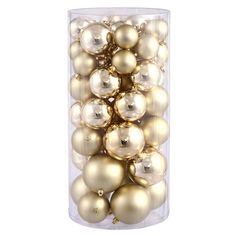 gold and silver ornaments in a clear container