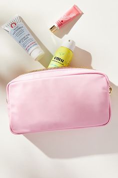 The classic-of-all-classic Stoney Clover Lane items, a Small Pouch is the most versatile piece — its uses range from makeup case to snack carrier to tech charger bag to receipt organizer. | Classic Small Pouch by Stoney Clover Lane in Pink, Women's, Nylon at Anthropologie Pink Everyday Travel Pouch, Trendy Travel Cosmetic Bag With Zipper Pocket, Functional Pink Portable Cosmetic Bag, Functional Pink Pouch For On-the-go, Pink Functional Pouch For On-the-go, Pink Zipper Pouch Travel Accessories For Daily Use, Functional Pink Cosmetic Bag For Daily Use, Functional Rectangular Cosmetic Bag For On-the-go, Pink Cosmetic Storage With Zipper For Everyday Use