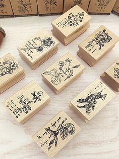 several wooden stamps with designs on them