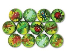 twelve green and red glass cabochles with bugs on them, all painted in different colors